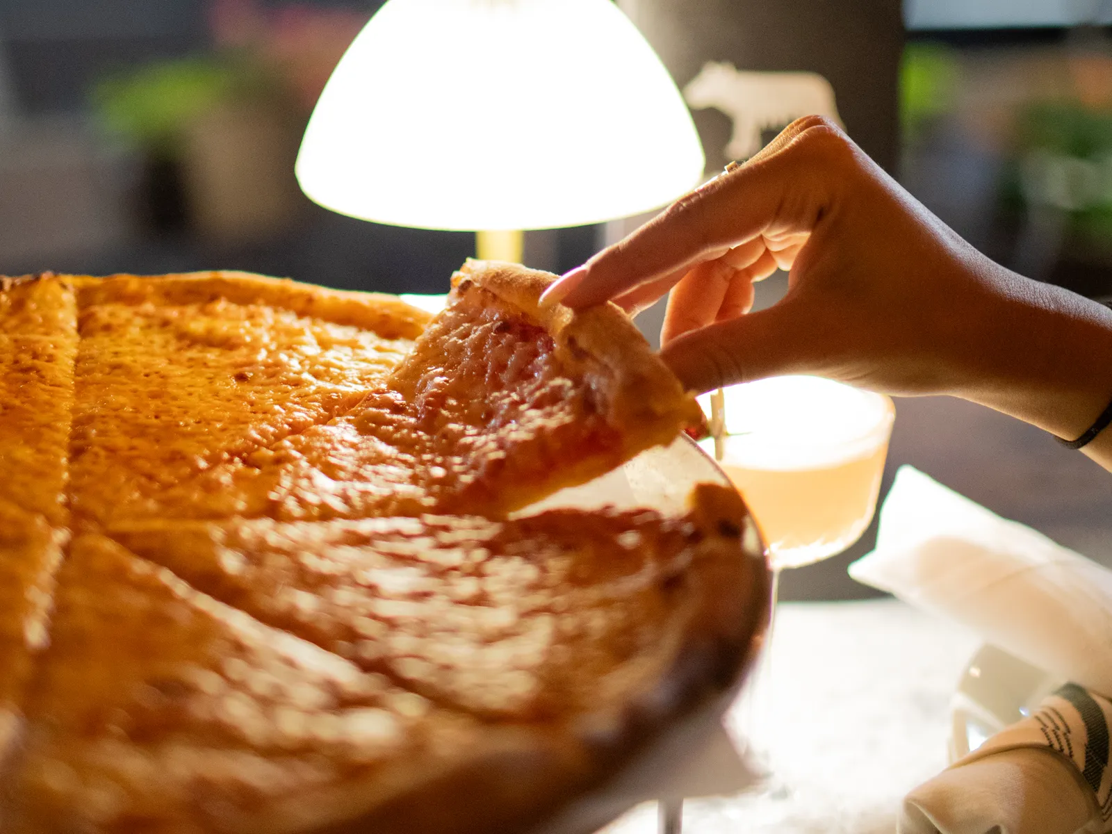 Pulling a slice on the patio at night